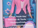 poupée Barbie dans une boîte, avec une veste rose et un chapeau