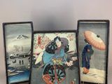 three framed pictures of a woman with an umbrella and a man with a parasol