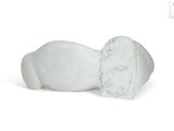 a white marble sculpture of a man laying on a white surface