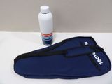 a bottle of water and a blue bag on a table