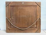 a picture of a wooden picture frame with a rope on it