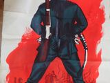 an old movie poster of a man in a black suit holding a gun