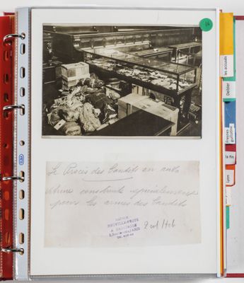 an old photo of a factory with a lot of papers