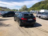 a lot of cars parked in a parking lot