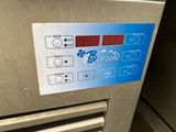 a close up of a machine with buttons and buttons on it