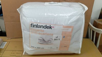 a bag of bedding sitting on top of a table