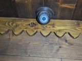 a picture of a wood floor with a light on it