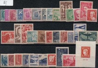 several different types of stamps are displayed on a black surface