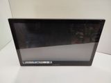 a black laptop computer sitting on a white table