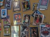 many cards on the wall of a room with a lot of them