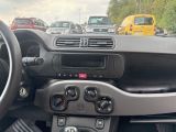 a dashboard of a car with a lot of cars in the background