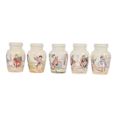 three vases with pictures of people on them sitting next to each other