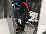 a computer case with a lot of wires in it