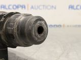 an image of a close up of a drill on a table