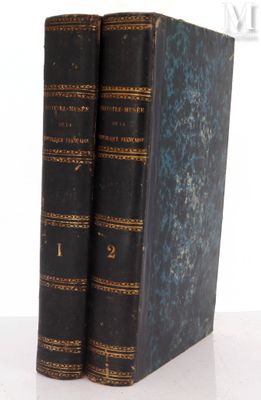 two books that are sitting next to each other on a table