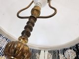 a lamp that is hanging from the ceiling in the room