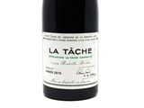 a bottle of wine that is sitting on a table