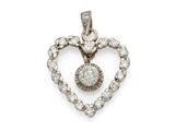 a diamond heart pendant on a white background