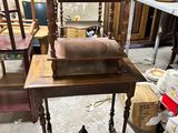 a table with a chair and a chair on it in a room