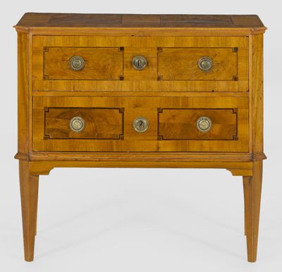 a wooden chest of drawers with three drawers on each side