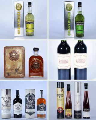 de nombreux types de bouteilles d'alcool et autres bouteilles exposées