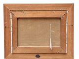 an old wooden picture frame with a piece of fabric hanging from it
