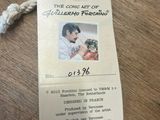 a tag with a picture of a man holding a baby