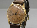 an image of a wrist watch with a brown leather strap