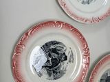 three plates with a picture of a man and a woman on them