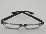 a pair of glasses sitting on top of a white table