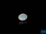 a white oplite in a black background