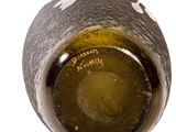 underside view of a wine bottle with a cork stopper on it