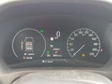 a close up of a car dashboard with a speedometer