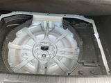 the inside of a car with the door open showing the inside of it