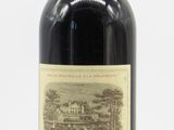 a bottle of wine that is sitting on a table