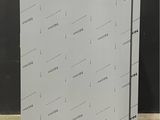 an image of a white refrigerator sitting on top of a wooden floor