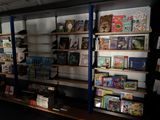 many books on the shelves in the room