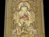 a close up of a tapestry hanging on a wall