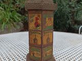 a small decorative box sitting on top of a table
