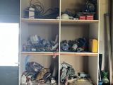 a room that has a bunch of shoes on the shelves