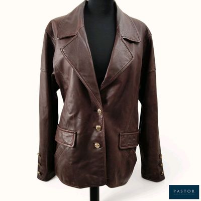 brown leather jacket on a mannequin dummy on a white background