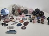 many different types of stones on the table