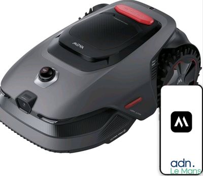 an image of a robotic lawn mower with a remote control