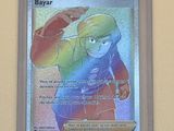 une photo d'une carte Pokémon sur laquelle figure l'image d'un garçon