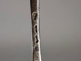 close up of a spoon with a fork sticking out of it