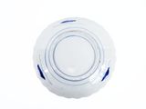 a white plate with a blue stripe on it