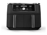 a black air fryer sitting on top of a white counter