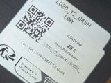 a person holding a piece of paper with a qr code on it