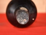 a close up of a bottle of wine on a table