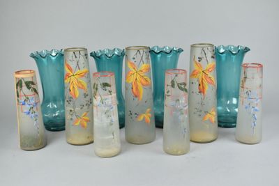 seven vases that have been painted with flowers on them